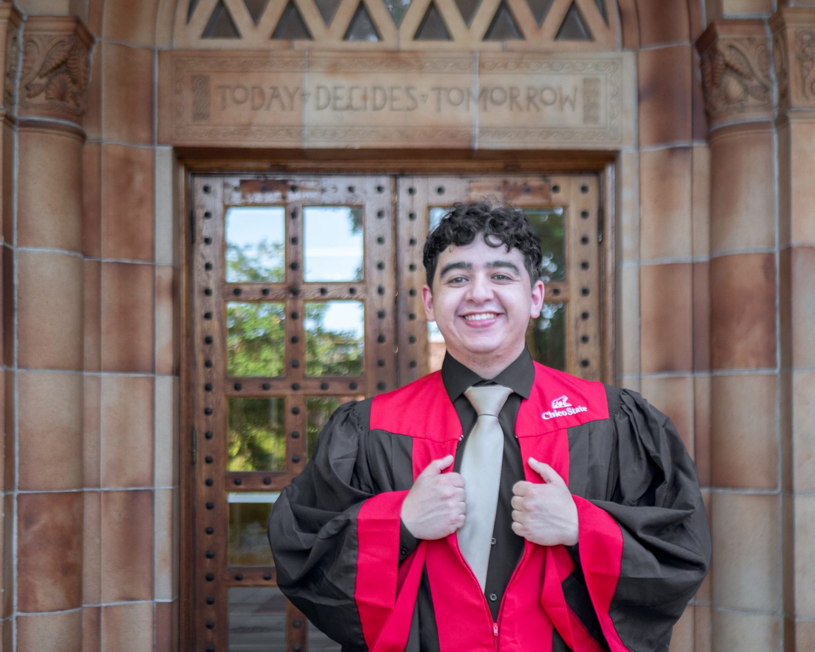 Senior graduation portrait — Greg on campus